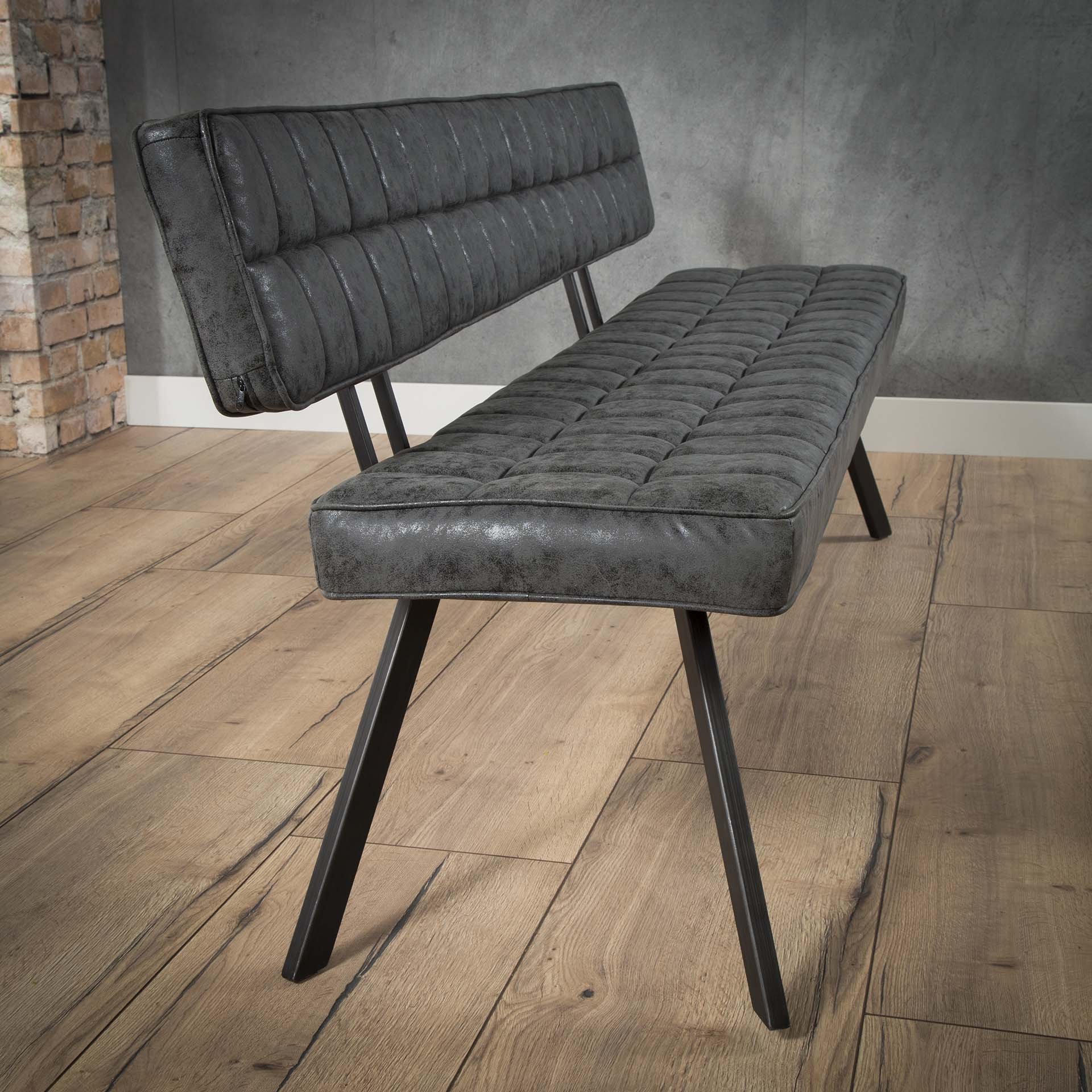 Eetkamerbank 180 cm voorzien van kruisstiksel en een open rug. / Wax PU zwart