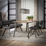 Eetkamerbank 180 cm voorzien van kruisstiksel en een open rug. / Wax PU zwart