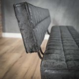 Eetkamerbank 180 cm voorzien van kruisstiksel en een open rug. / Wax PU zwart